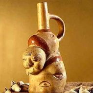 Mythlok - Axomamma carving A close-up view of Axomamma's sacred potato symbol