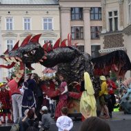 Aitvaras depicted as a fiery bird with sharp claws and tail