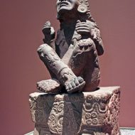 A figure of the seated Aztec God, Xochipilli
