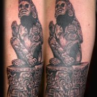 A tattoo of the seated Aztec God, Xochipilli