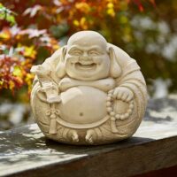 Carving of The famous laughing buddha of China, Budai