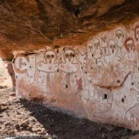 AUSTRALIA, Western Australia, West Kimberley.  Wandjina (creator beings), rock art style painted during last 4000 years.