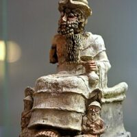 "Statue of Enki, capturing the deity in a traditional pose with detailed features."