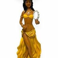 Figurine of Oshun, adorned with gold and flowing garments.