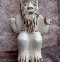 "Figurine of Tupa, capturing the deity in miniature with intricate features."