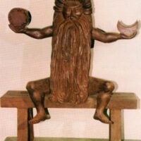 "Statue of Tupa, the Supreme God, showing detailed craftsmanship and a commanding presence."