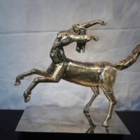 Figurine of Anggitay, half-woman, half-horse, in motion.