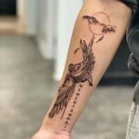 Tattoo of Icarus inked on a man&rsquo;s hand.