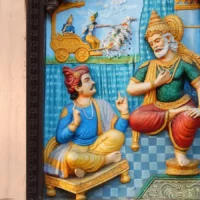 Mythlok - Dhritarashtra wall carving Wall carving of the blind king Dhritarashtra and Sanjaya