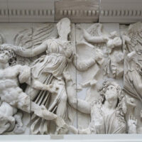 Stone carving featuring Alcyoneus