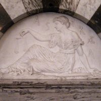 Carving showing Astraea the Greek goddess