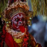Theyyam dance involving Parakutty Chathan