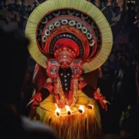 Theyyam dance involving Parakutty Chathan