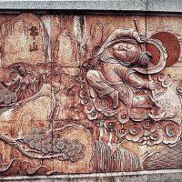 Wall carving of the chinese demigod Liu Chenxiang